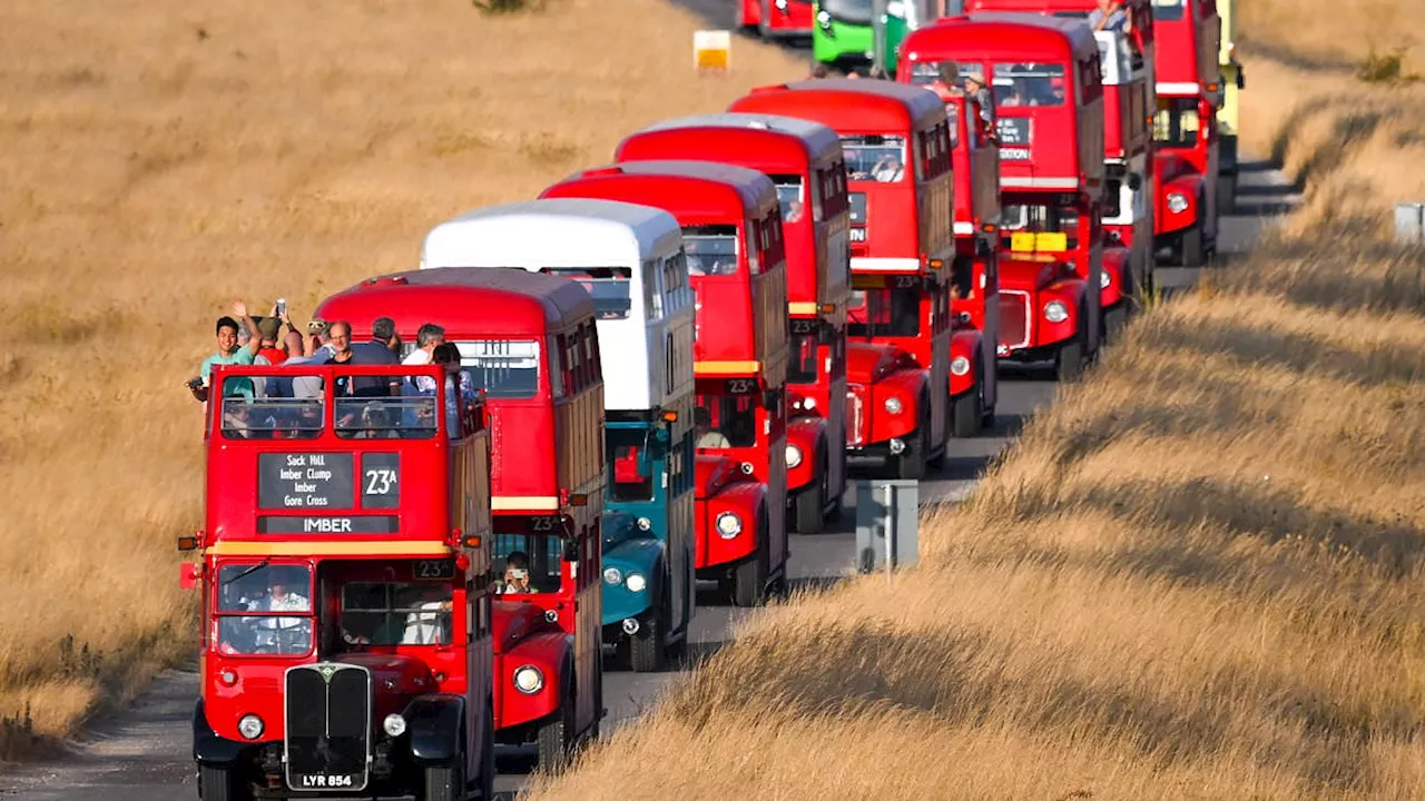 Vintage Red Buses Take Passengers on Rare Journey to Abandoned Village