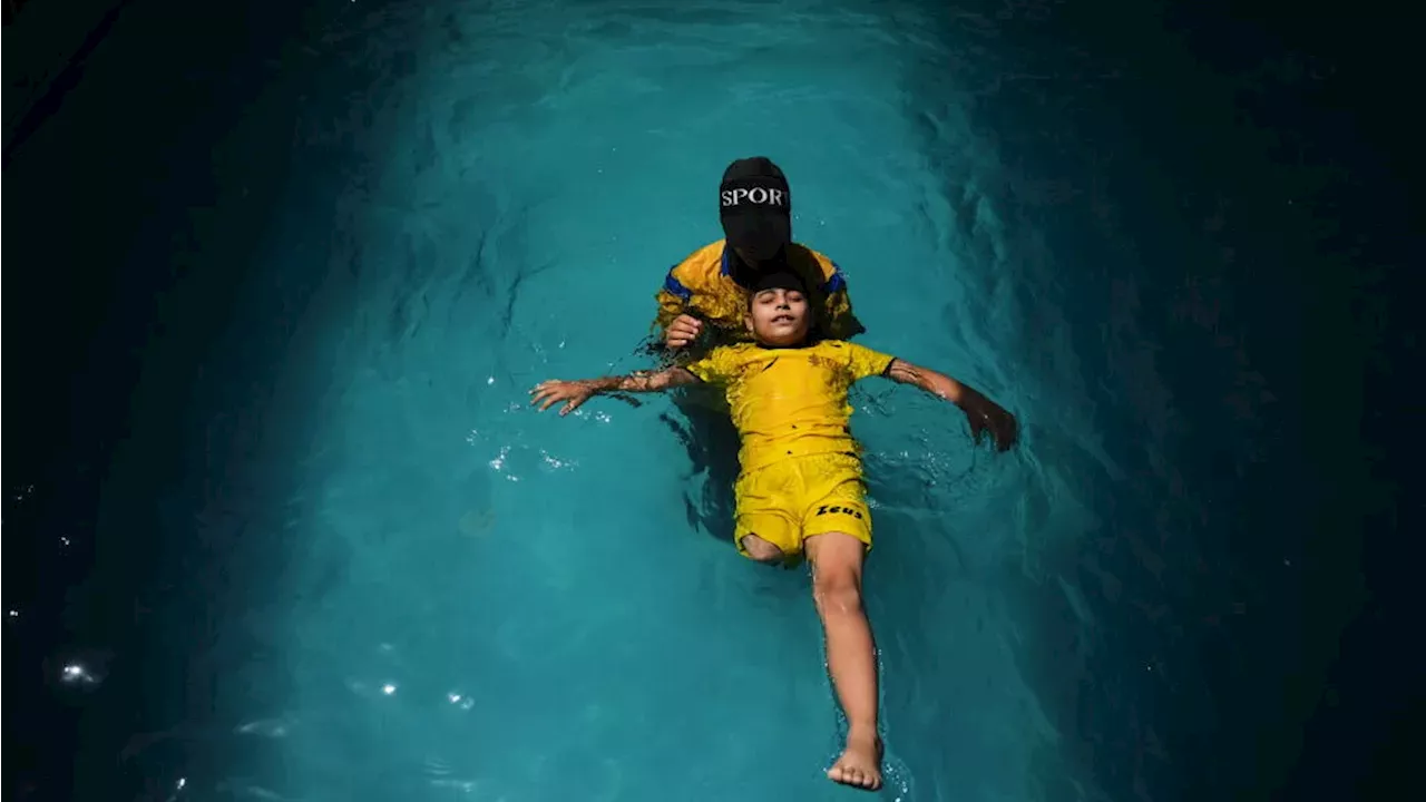 Beyond the Prosthetics: How Swimming is Reclaiming Childhood in Khan Younis