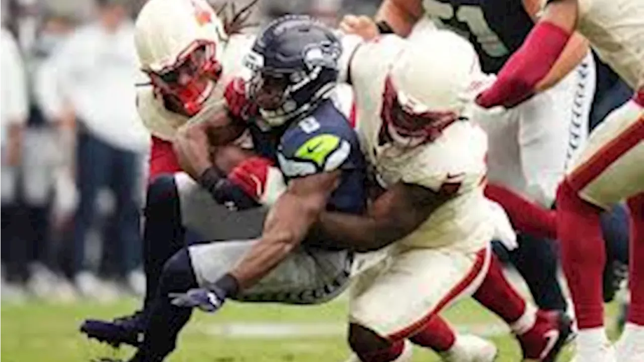 Seahawks Triumph Over Cardinals, But Lose Rookie RB Price to Injury