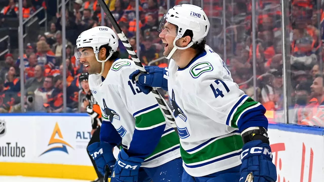 Cotter's Debut Magic Lifts Canucks Over Oilers in Overtime Thriller