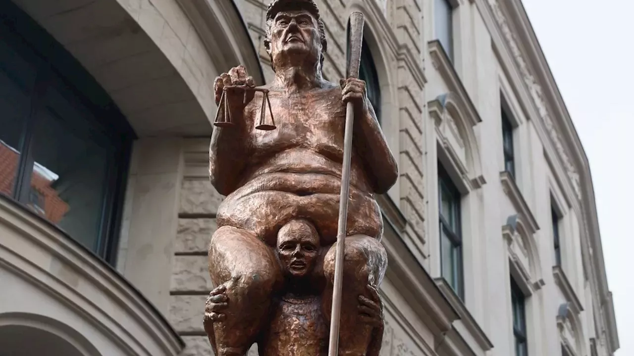 Gold-Leaf Satire: Naked Trump Statue Sparks Climate Clash at European Parliament