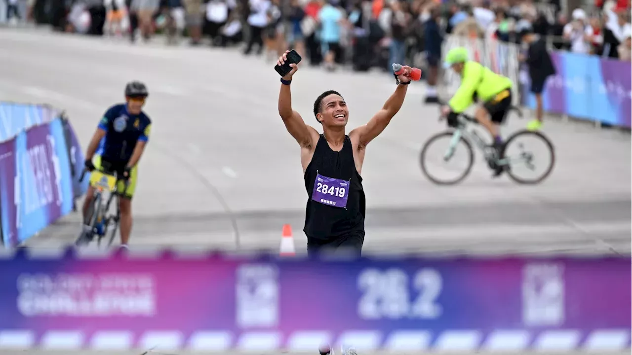 Smith and Madzia Brave the Rain for Long Beach Marathon Glory