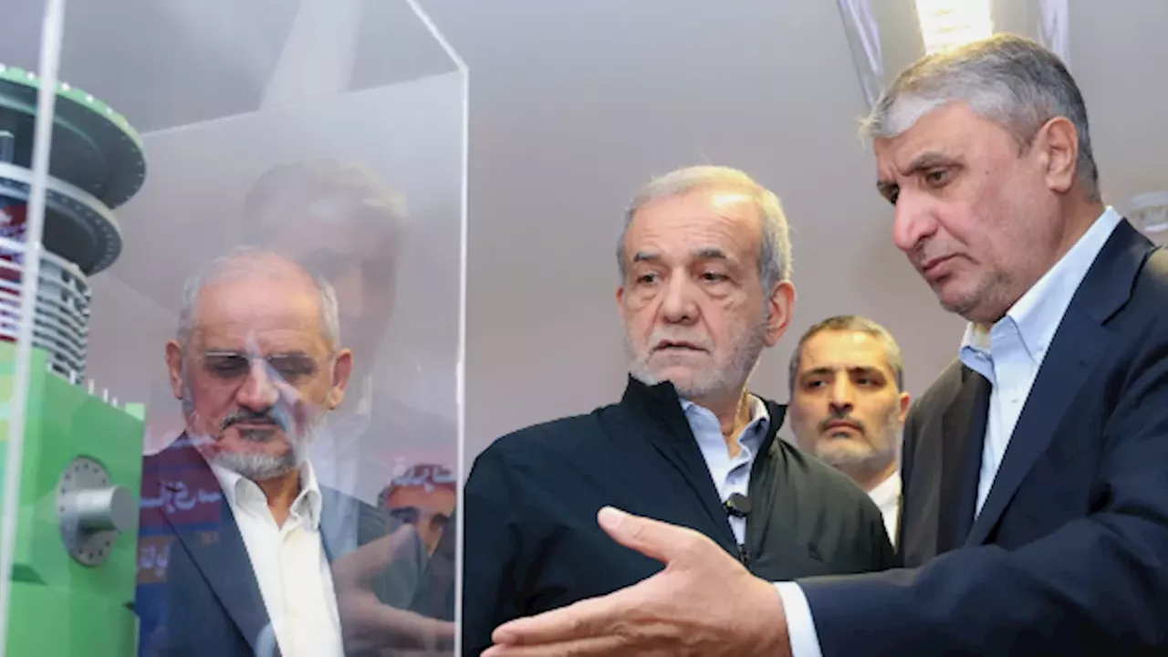 Iran's Nuclear Divide: Eslami's Triumph vs. Zarif's Warning