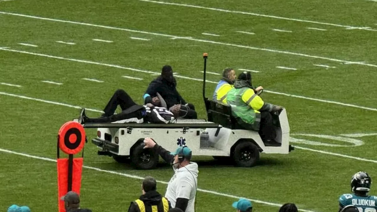 Wembley's Wet Turf Sidelines NFL Umpire Larry Smith During Texans-Jaguars Matchup