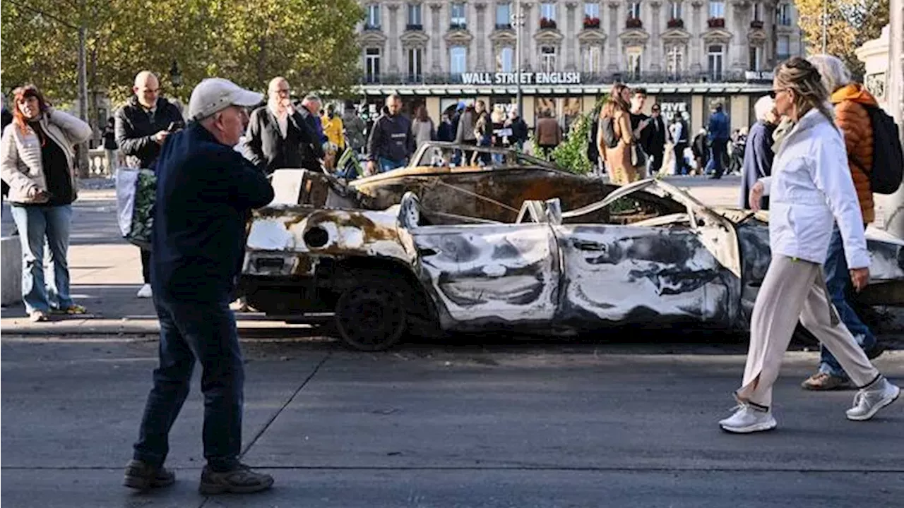 France arrests 1,800 after violent protests and looting across the country