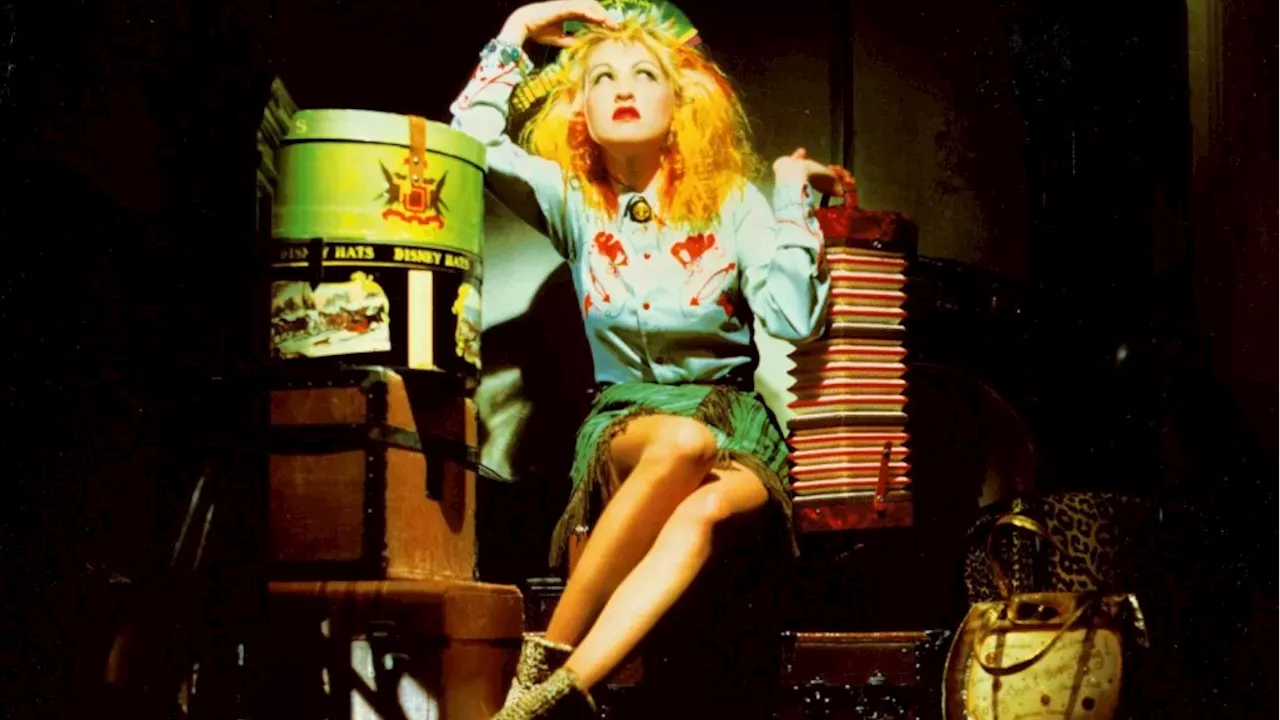 Beyond the Closet: Cyndi Lauper’s Auction Sparks a Critique of Corporate Fashion