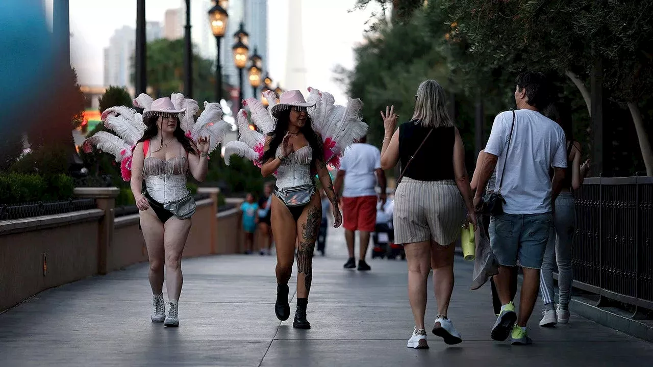 Las Vegas targets costumed performers who pressure tourists for tips on the Strip