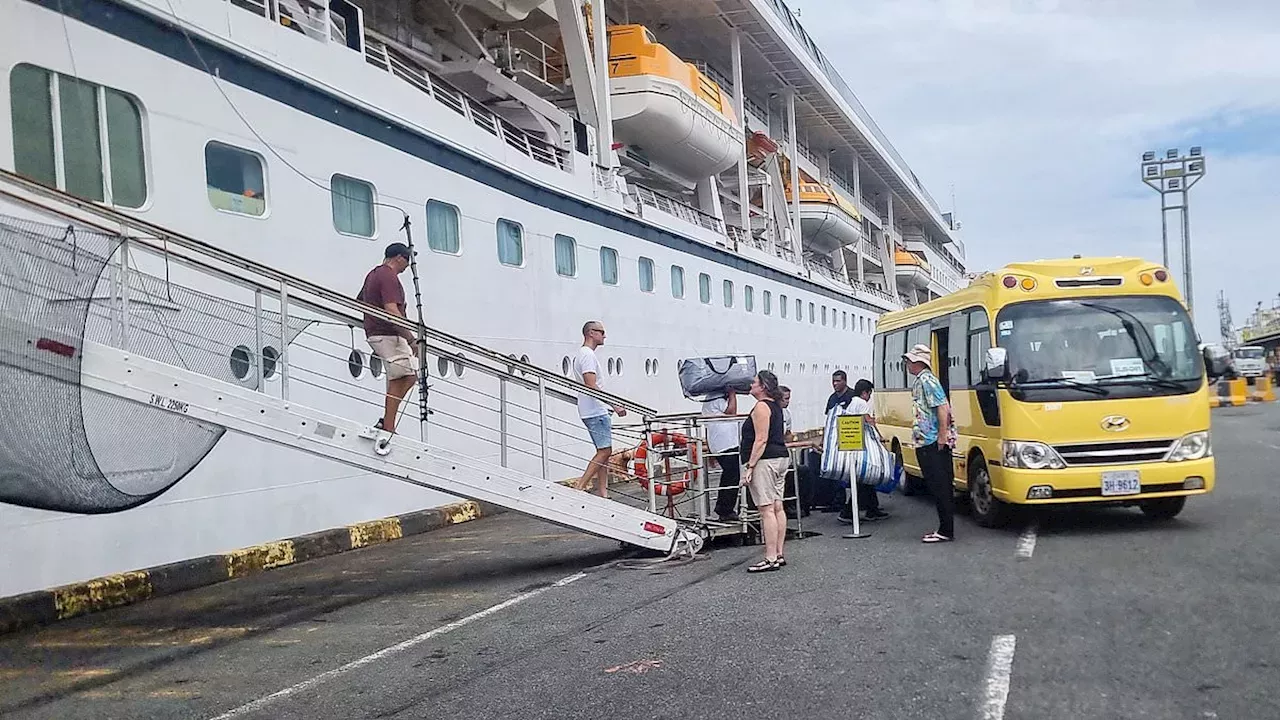 Passengers on board luxury 'cruise for life' are dumped in Cambodian port after company 'begs for cash' and then cancels voyage due to fuel costs